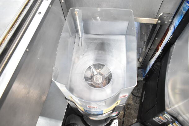 Taylor X81173-12 commercial countertop frozen beverage mixer, clear container, visible agitator, good condition.