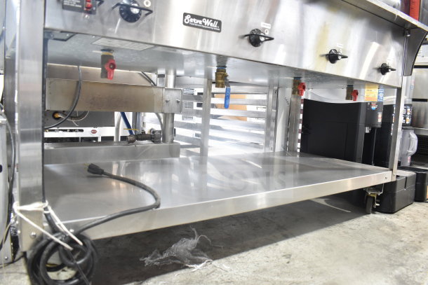 Vollrath ServeWell 38218 electric 4-bay steam table; stainless steel; 208-240V, 1 phase; good condition; power cords shown.