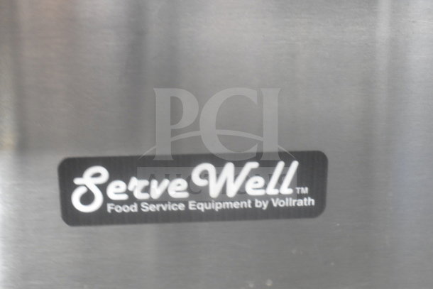 Vollrath ServeWell 38218 label on commercial 4-bay steam table, stainless steel, 208-240V, 1 phase, electric-powered.