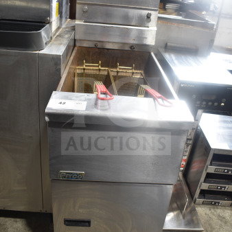 Pitco Frialator commercial deep fryer, floor style, natural gas, 110,000 BTU, silver finish, dual baskets, visible Pitco logo.