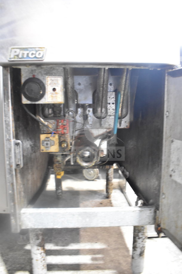 Pitco Frialator commercial deep fat fryer, natural gas powered, 110,000 BTU. Visible wear, metal casing and control panel.