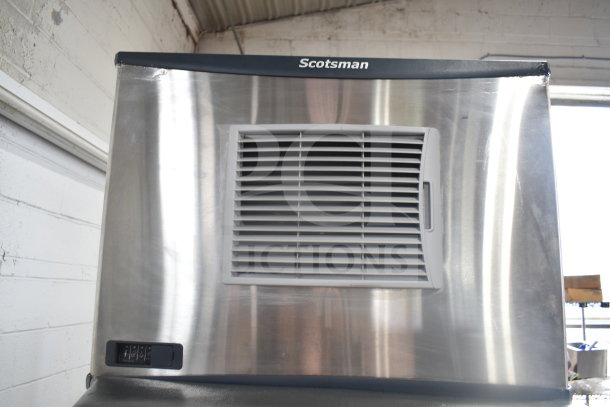2019 Scotsman C0530MA-1E Ice Head on Scotsman ID200B-1A Dispenser. Stainless steel, 115V, 1 Phase, visible on/off switch.