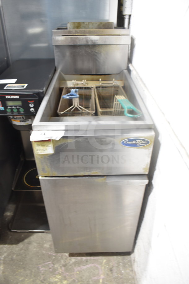 Cook Rite ATFS-40 commercial natural gas deep fryer, stainless steel, two fryer baskets, visible wear, label on front.
