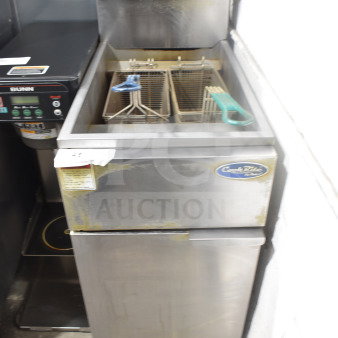 Cook Rite ATFS-40 commercial natural gas deep fryer, stainless steel, two fryer baskets, visible wear, label on front.