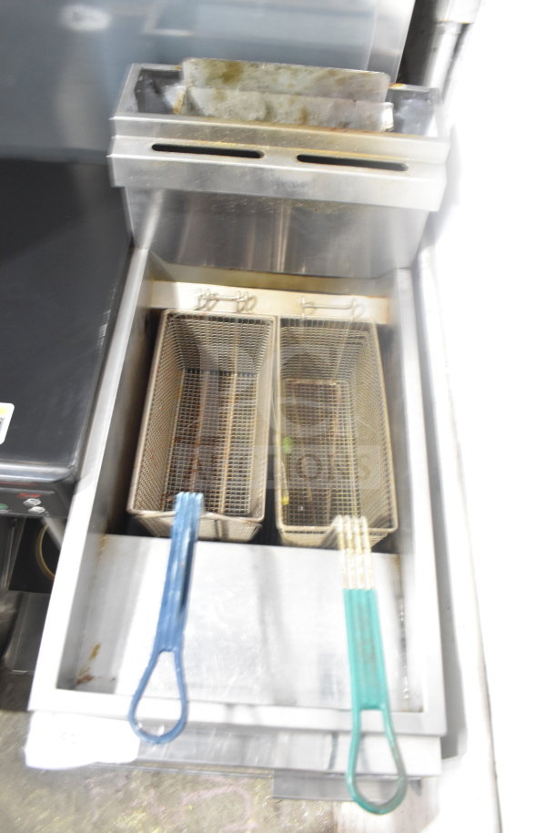 Cook Rite ATFS-40 commercial natural gas fryer with dual baskets, stainless steel, floor model, slight wear visible.
