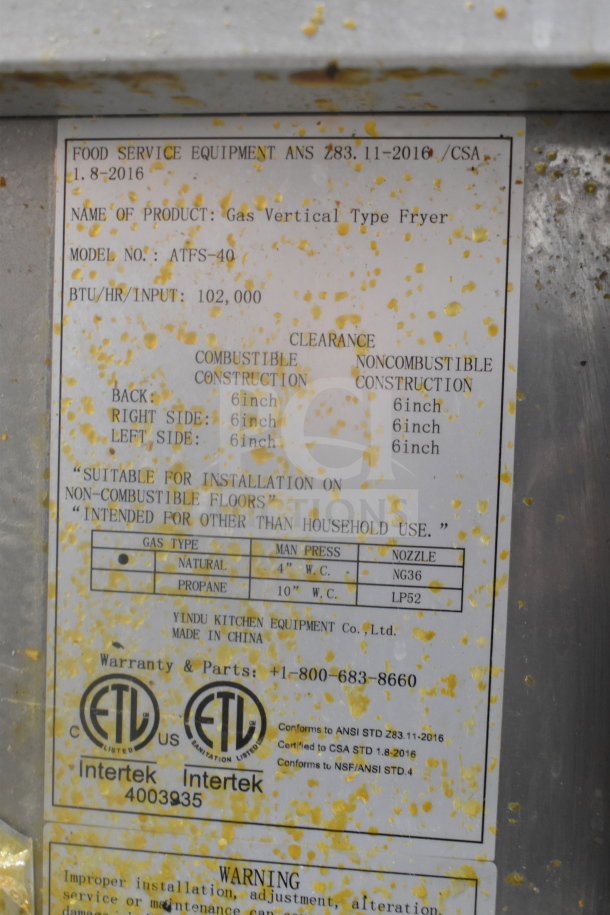 Cook Rite ATFS-40 Natural Gas Fryer label with model, BTU/hr 102,000, installation guidelines, and certification marks.