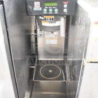 Bunn ITCB-DV Commercial Iced Tea Machine, 120V, stainless steel, digital controls, hot liquid warning label visible.