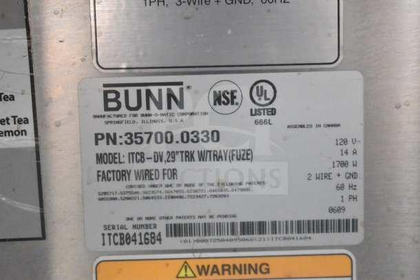Bunn ITCB-DV Commercial Iced Tea Machine label. Model and specs visible, including 120V, 1 phase, NSF certified.