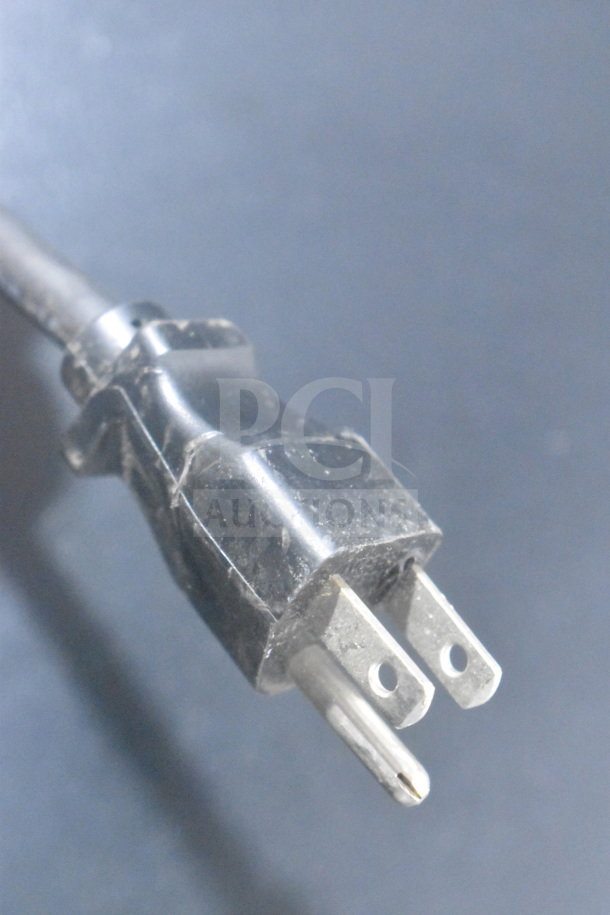 Close-up of a 120V power plug from a Bunn ITCB-DV Commercial Iced Tea Machine.