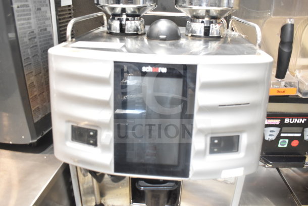 Schaerer Coffee Art Espresso Machine in stainless steel, dual hoppers, touchscreen interface, excellent condition.