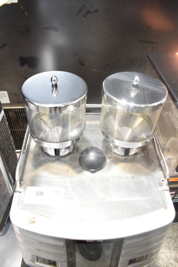 Schaerer Coffee Art Espresso Machine with dual bean hoppers, stainless steel finish, and visible wear. Tag indicates quantity 50.
