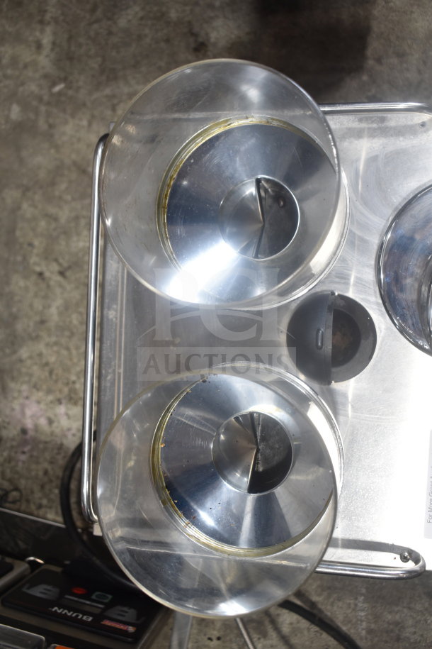 Schaerer Coffee Art Espresso Machine, dual grinder hoppers, stainless steel, used condition, visible signs of wear.