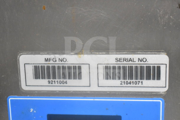 AJ Antunes Commercial Countertop Bun Toaster, visible tags showing MFG No. 9211004 and Serial No. 21041071.