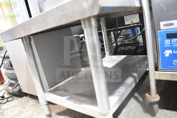 Vevor BOL-7220T Commercial Soft Serve Ice Cream Machine with twist feature on a mobile equipment stand.
