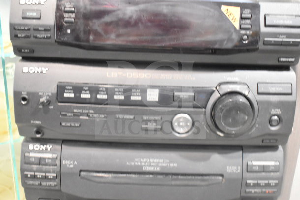 Sony LBT-D590 CD player with dual cassette deck. Features sound control options, EQ settings, and auto reverse.
