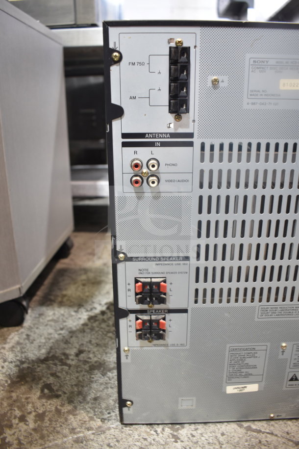 Sony CD Player showing rear panel with antenna ports, audio inputs, and speaker connections. Good condition, model details visible.