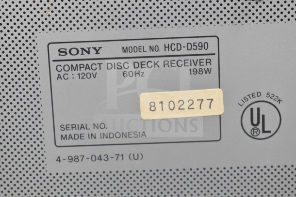 Sony CD Player model HCD-D590 label with specifications: 120V, 60Hz, 198W. Serial number 8102277. Made in Indonesia.