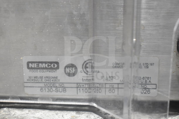 Nemco 6130-SUB commercial food warmer with 2 wells and poly holder, 120V, NSF certified, label shows model and voltage details.