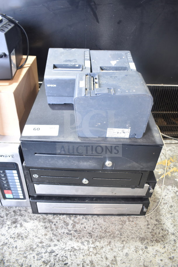 7 items including 4 cash drawers and 3 Epson receipt printers. Used condition, visible wear, label "60".