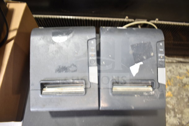 Lot of 7 items: 4 cash drawers and 3 Epson receipt printers. Used condition, visible wear and tape residue.