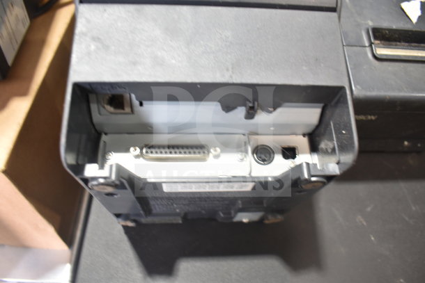 Set of 7 items: 4 cash drawers and 3 Epson receipt printers. Condition: used. Showing back panel connections.