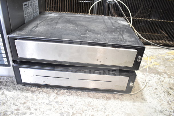 Four cash drawers with metallic fronts and locks. Slight wear visible; part of a 7-item lot with Epson printers.