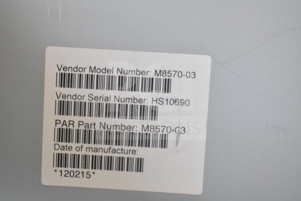 Label on auction item with Vendor Model M8570-03, Serial HS10690, and PAR Part M8570-03 details visible.