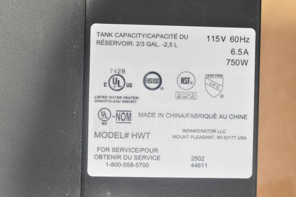 Insinkerator hot water heater label showing model HWT, 2/3 gal capacity, 115V, 750W, lead-free, made in China.
