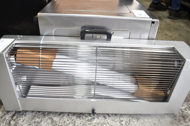 219GT Bug Zapper, 120 Volts, 1 Phase. Model 219GT with protective grill, ideal for indoor use. Appears in good condition.