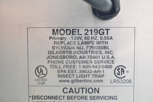 Gilbert 219GT Bug Zapper label showing model number, 120V, 60Hz specs, replacement info, and contact details.