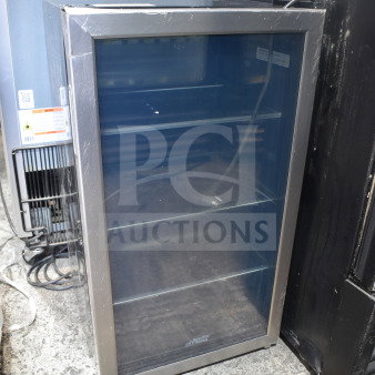 Arctic King ARV115B1AST mini cooler merchandiser, 115 volts, 1 phase. Stainless steel frame, glass front, multiple shelves, gently used.