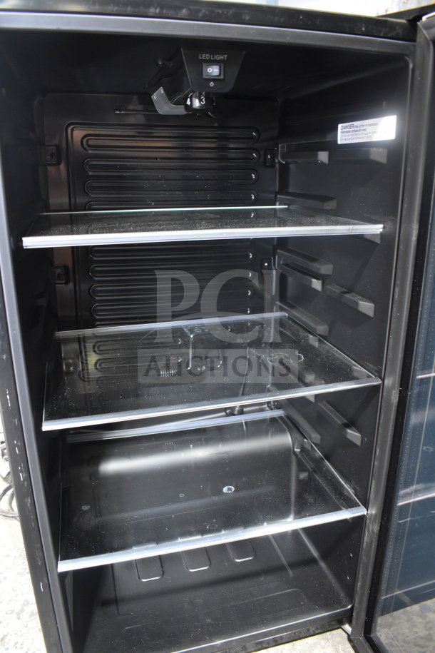 Arctic King mini cooler merchandiser ARV115B1AST, 115V, with LED light, three glass shelves, and adjustable temperature control.
