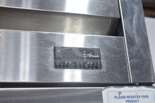 2022 True T-19F-HC commercial freezer, single door, stainless steel, digital display. In good condition, on casters.