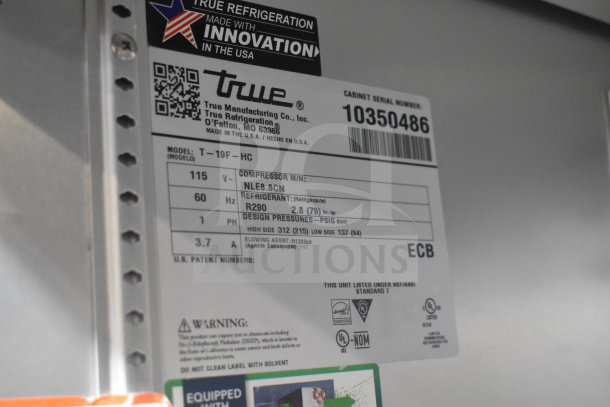 2022 True T-19F-HC single door freezer tag, 115V, 1 phase, R290 refrigerant, made in USA, model and serial numbers visible.