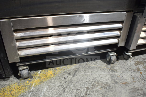 2022 True T-19F-HC commercial freezer on casters, stainless steel exterior, 115V, 1 Phase, visible wear on lower vent.