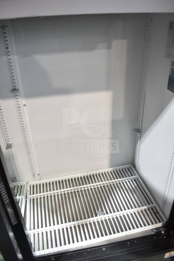 2019 True GDM-41SL-48-HC-LD Commercial Cooler, 2 glass doors, 115V, white interior, metal shelves, clean condition.