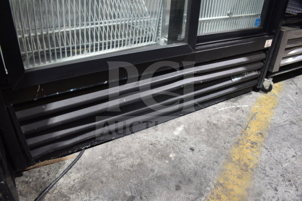 2019 True GDM-41SL-48-HC-LD 2 Door Cooler, black finish, visible shelves, minor scuffs, 115V, 1 phase, commercial use.