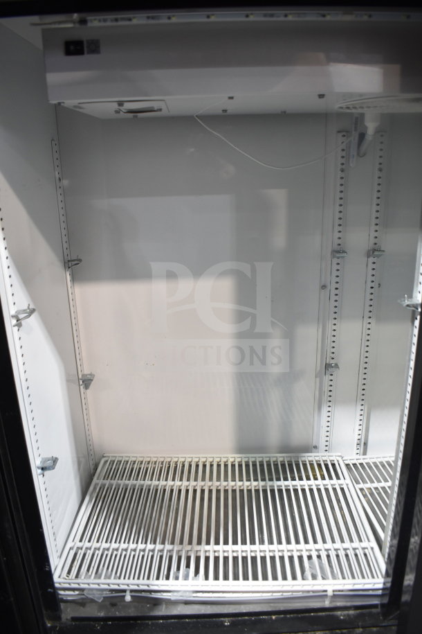 2019 True GDM-41SL-48-HC-LD commercial cooler, 2 glass doors, white interior, 115 volts, 1 phase, excellent condition.