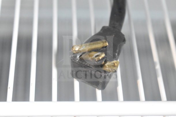Habco ESM14SL60C reach-in cooler plug detail, showing a 115V, 1-phase power connection on metal shelving.