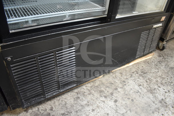 Habco ESM14SL60C commercial cooler, two-door, reach-in, 115V, black exterior, visible ventilation panel, good condition.