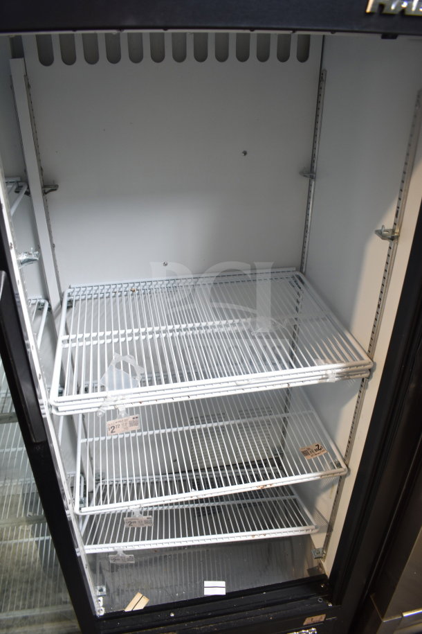 Habco ESM14SL60C commercial 2-door reach-in cooler. Features include adjustable wire shelves, black exterior, and interior lighting.
