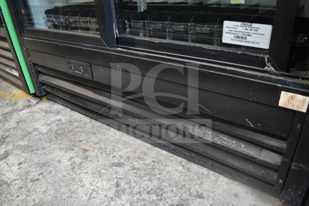True GDM-41SL-60EM-LD 2-door cooler merchandiser. 115V, 1 Phase. Black exterior with visible logo and label.