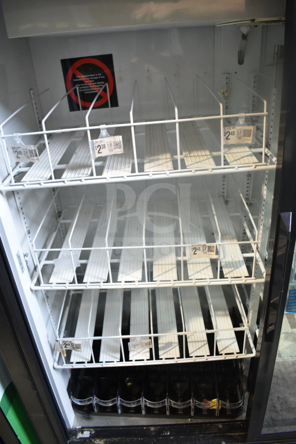 True GDM-41SL-60EM-LD 2-door cooler merchandiser, empty interior, adjustable white shelving, tags visible, 115V, 1 phase.