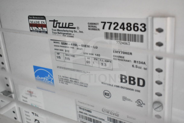 True GDM-41SL-60EM-LD commercial cooler label, 115 volts, 1 phase, serial 7724863. NSF, UL listed, R134A refrigerant.