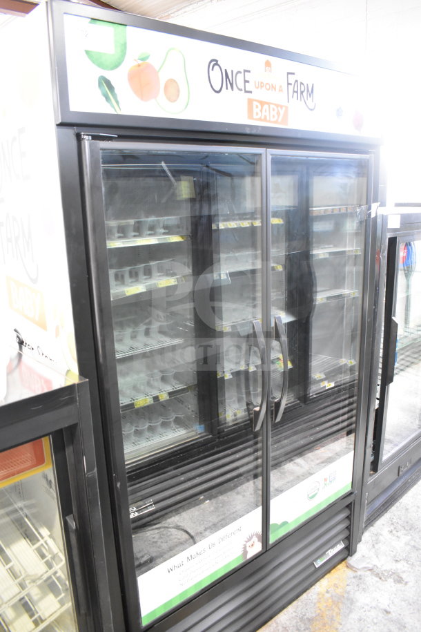 True GDM-41SL-60EM-LD 2 Door Cooler Merchandiser, glass doors, branding visible, good condition.