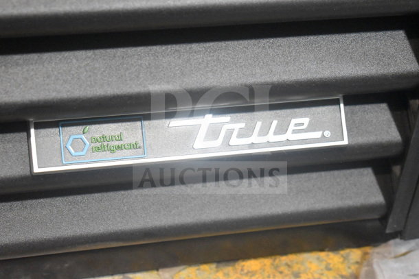 True GDM-41SL-60EM-LD cooler, featuring "natural refrigerant" label, 2-door design, 115 volts, 1 phase, commercial use.