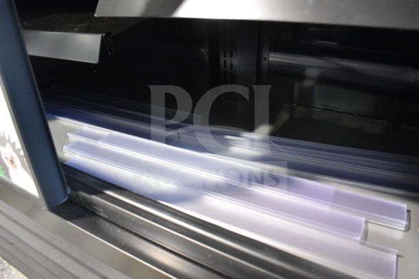 2026 True GDM-41SL-60EM-LD commercial cooler interior, shelves visible. Model for 115 Volts, 1 Phase use.
