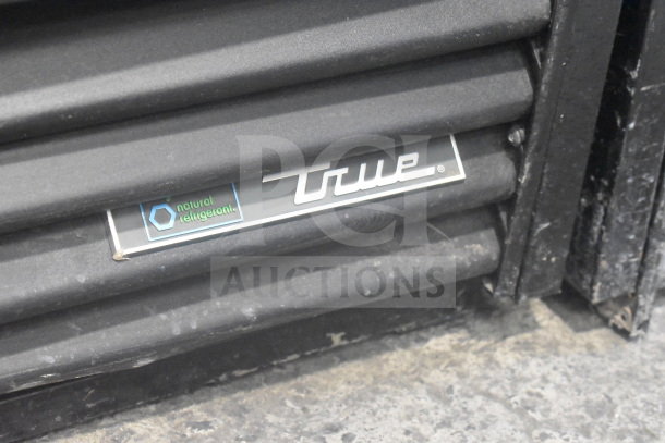 2019 True GDM-41SL-48-HC-LD cooler merchandiser, 2 doors, 115V, featuring natural refrigerant label.