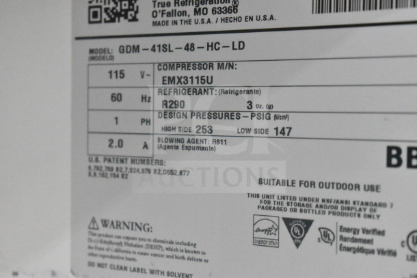Label on 2019 True GDM-41SL-48-HC-LD cooler, showing model, voltage, refrigerant, and design pressures.