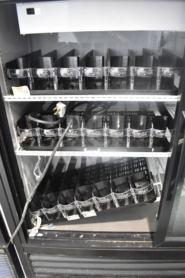 2019 True GDM-41SL-48-HC-LD 2-door reach-in cooler merchandiser, 115 volts, 1 phase, interior shelving, and visible power cord.